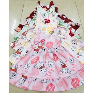 Đầm gấm xước bé