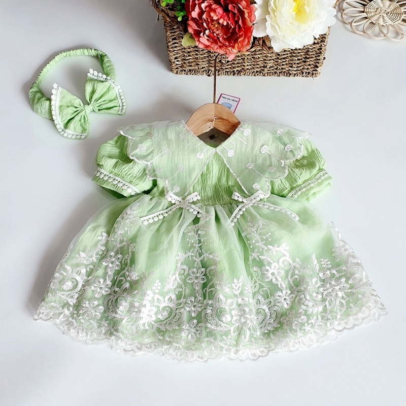 Váy Lolita Màu Xanh Cốm Cho Bé Gái 3 Đến 17kg Chất Đũi Xốp Nhún Phối Ren