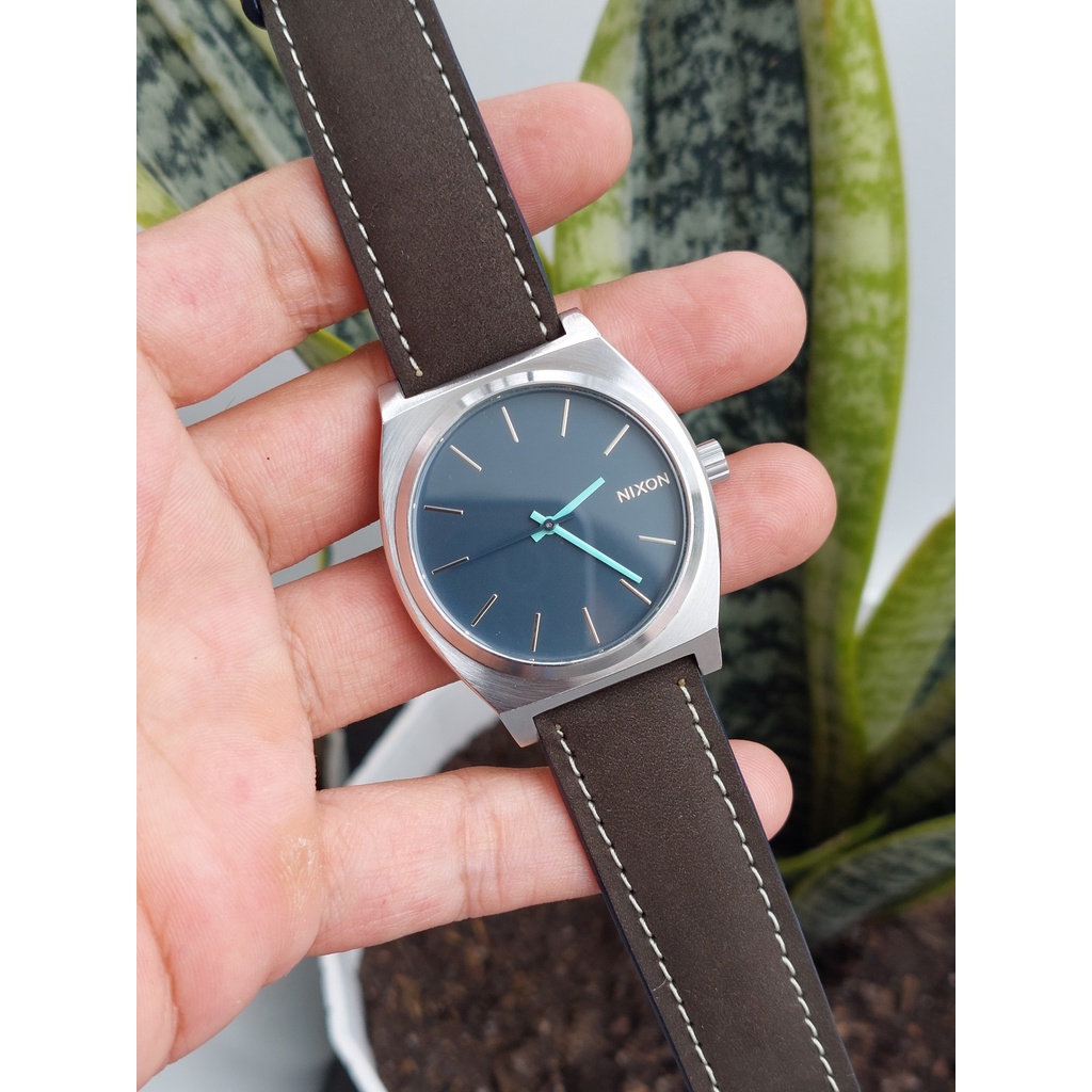 Đồng hồ nam Nixon mặt xanh chạy pin hàng Si