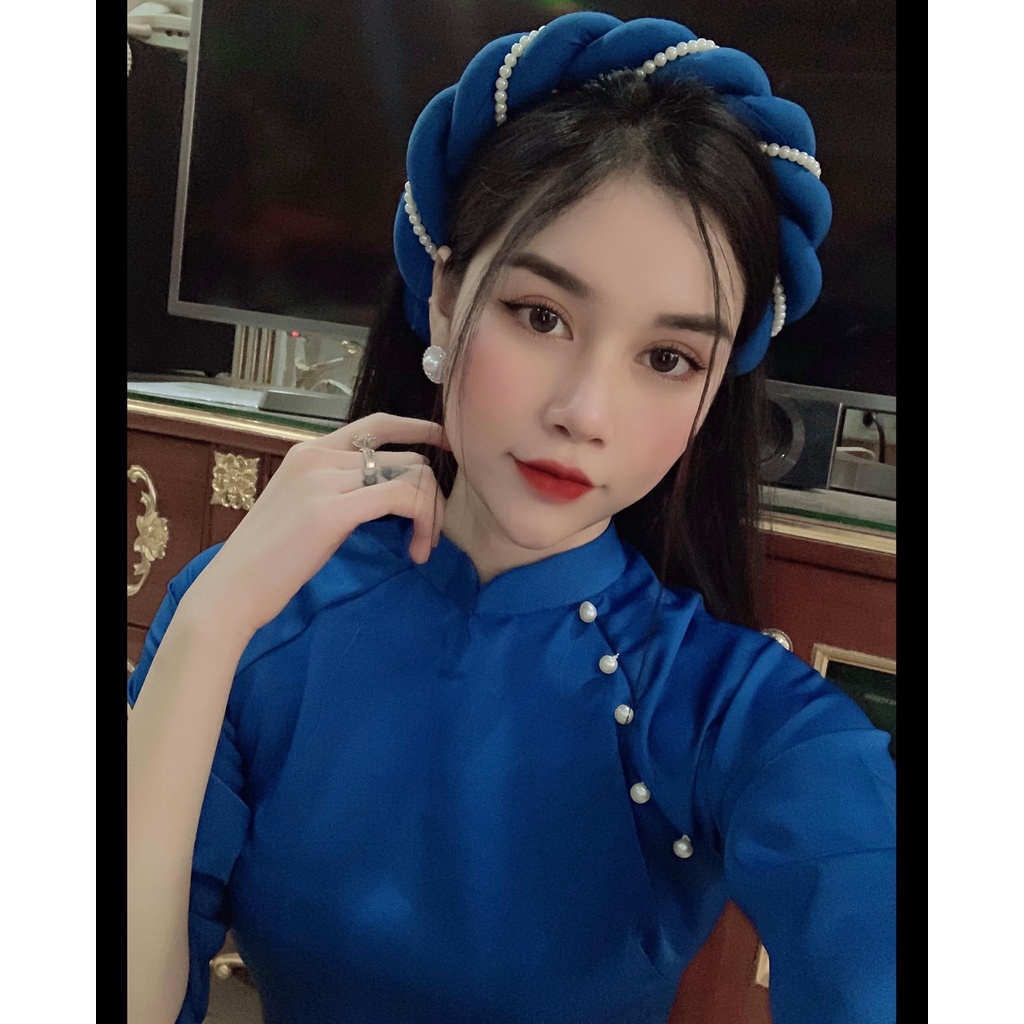 Áo dài nữ cách tân màu xanh trơn kèm mấn xinh cho các chị em