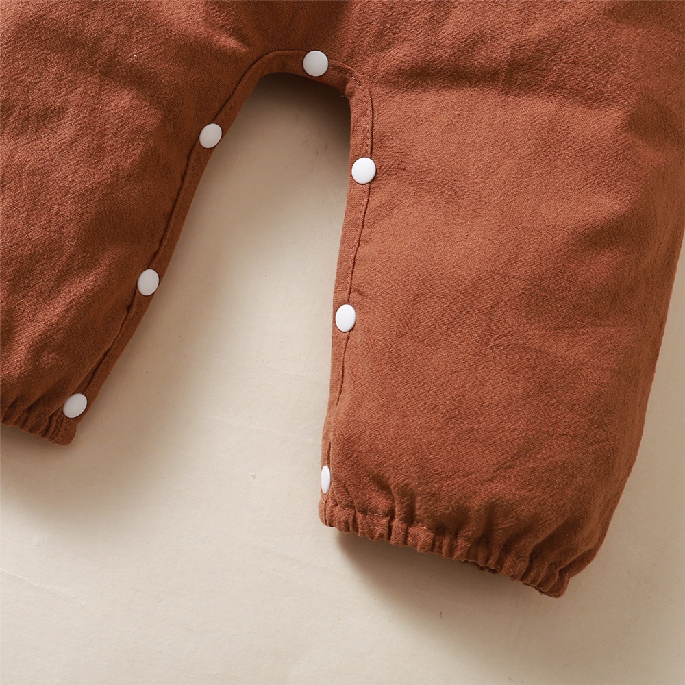 Bộ đồ MIKRDOO gồm áo liền quần tay dài màu nâu trơn kèm băng đô xinh xắn cho bé gái