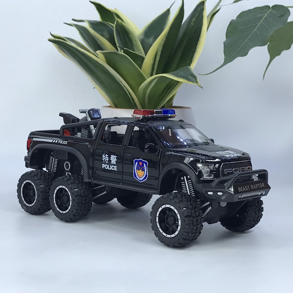 Mô hình xe cảnh sát Ford F150 Raptor 6x6 tỷ lệ 1:28 bằng kim loại có đèn chớp ưu tiên và còi hú chuyên dụng