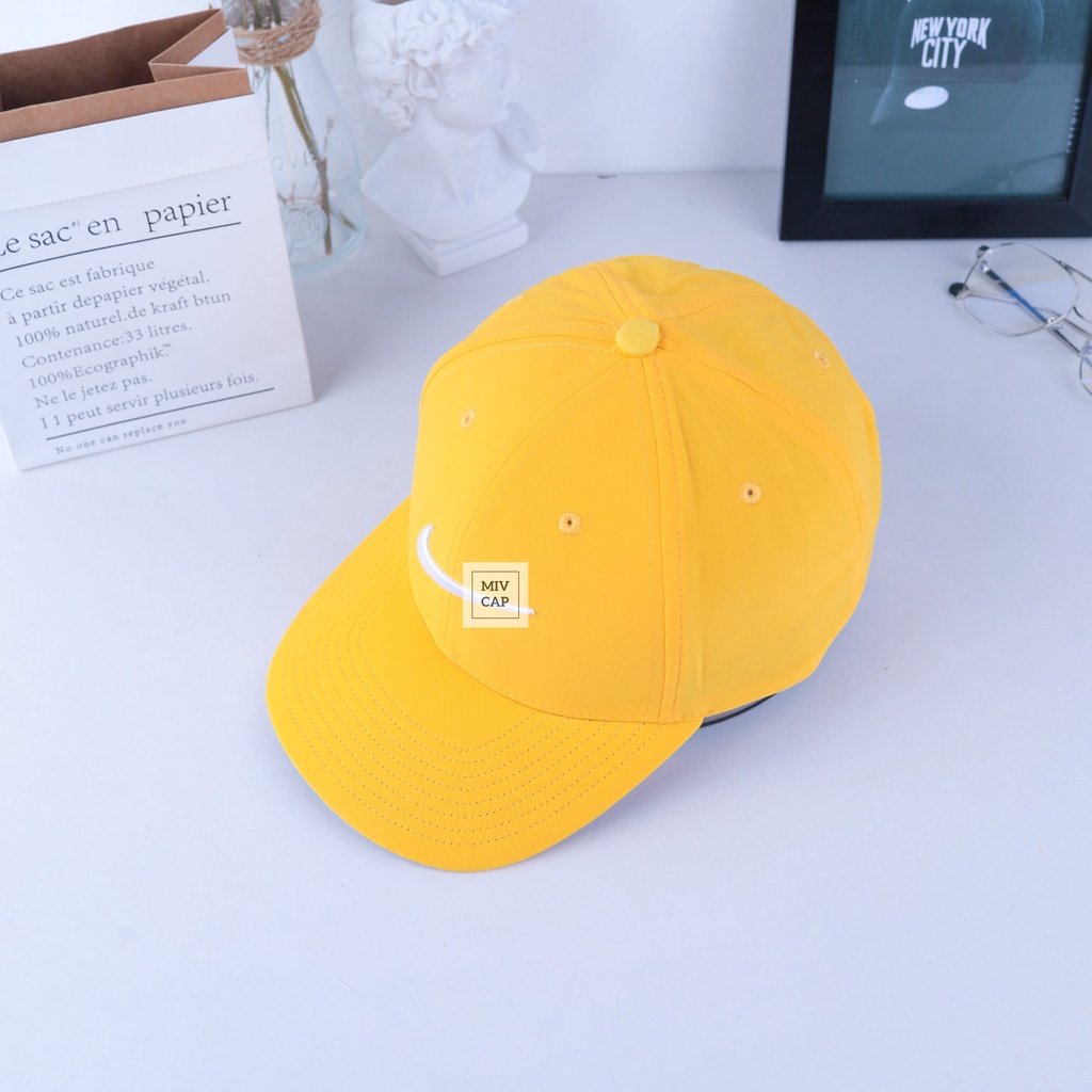 Mũ nón lưỡi trai form tròn Nikie logo đơn giản năng động màu vàng VNXK