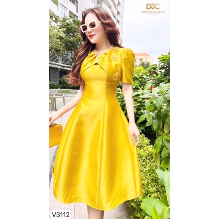 V3112 váy xoè màu vàng dính hoa