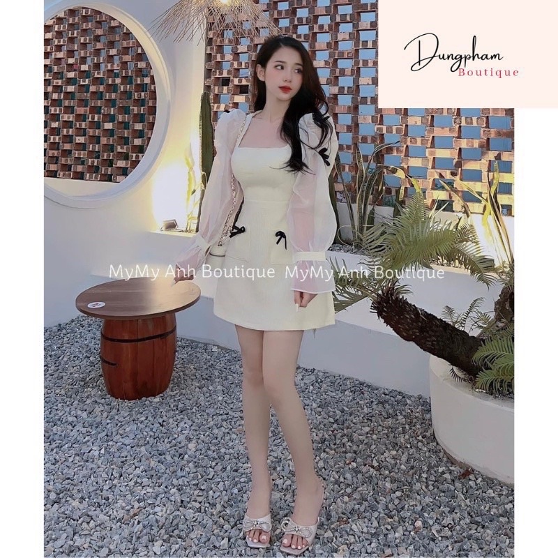 Đầm dạ cúp ngực phối tay tơ đính nơ 2 màu đen trắng
