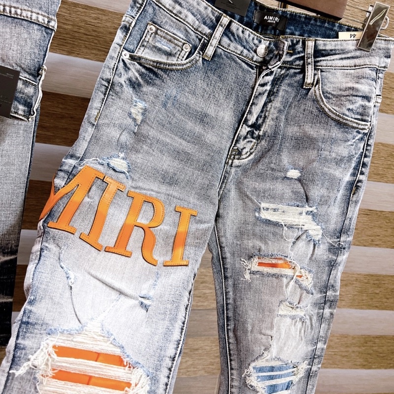 Quần jean bò nam Amiri wash xanh khói thêu chữ da cam đùi phối rách xước lót vải màu xanh cam dáng skinny QJ169P