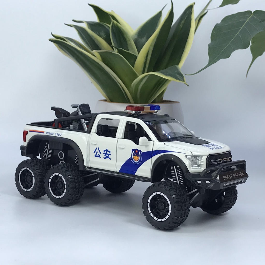 Mô hình xe cảnh sát Ford F150 Raptor 6x6 tỷ lệ 1:28 bằng kim loại có đèn chớp ưu tiên và còi hú chuyên dụng