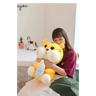 gấu bông hổ ôm bình sữa