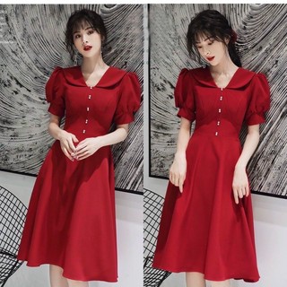 Đầm đỏ nút trắng
