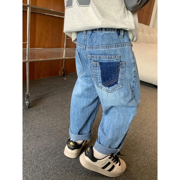 Quần bò túi rách bé trai