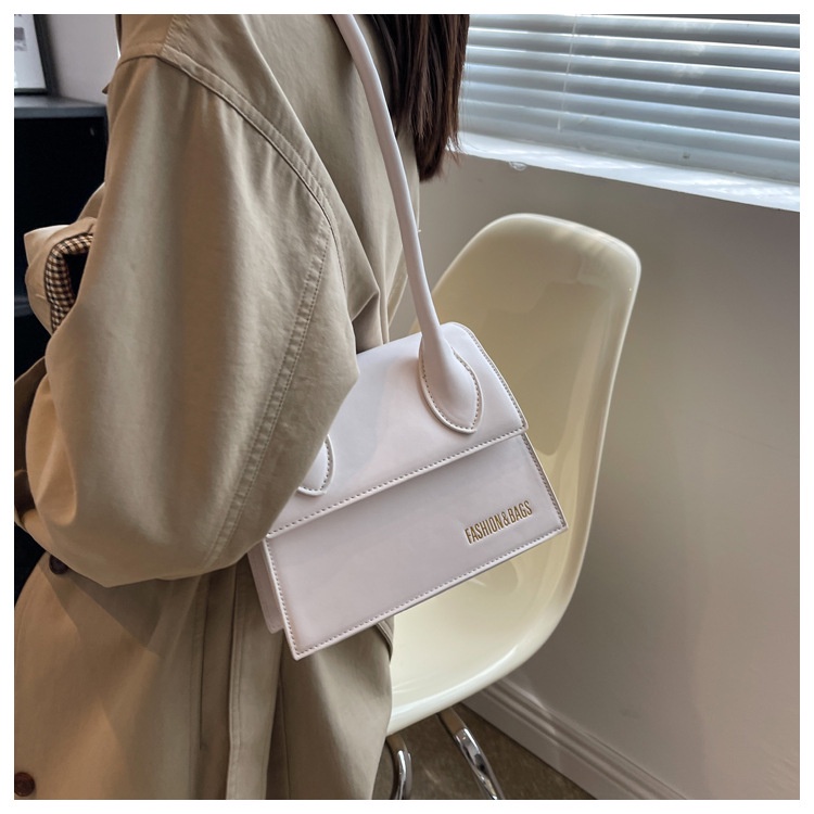 Túi xách nữ cầm tay đeo chéo đeo vai thời thượng quai xoắn có nút bấm LK297