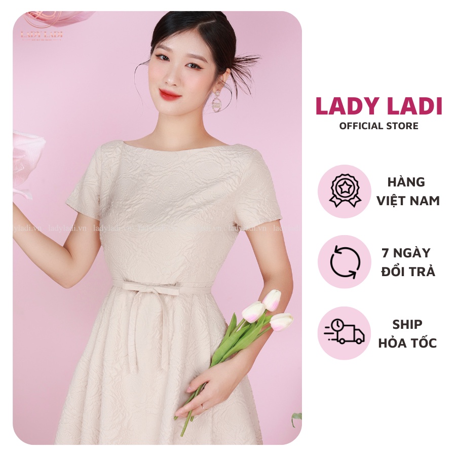Đầm xòe cổ thuyền dự tiệc đi làm Ladi Fashion khoét lưng màu be họa tiết hoa rập nổi DA118B