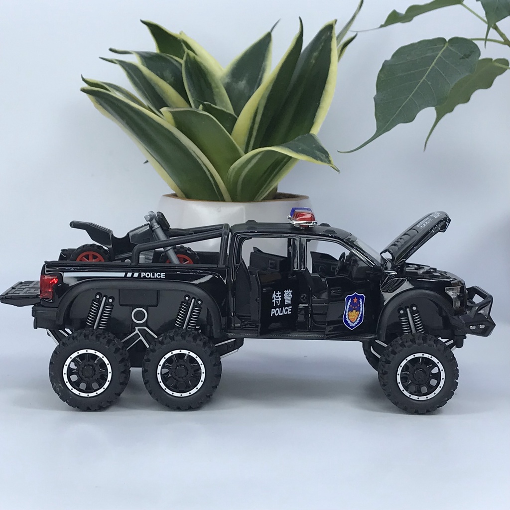 Mô hình xe cảnh sát Ford F150 Raptor 6x6 tỷ lệ 1:28 bằng kim loại có đèn chớp ưu tiên và còi hú chuyên dụng