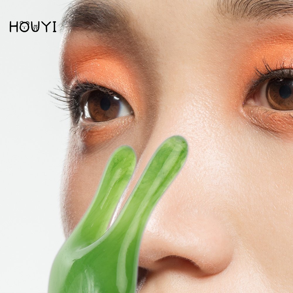 Thanh mát xa mũi bằng nhựa resin có đầu lăn tiện dụng