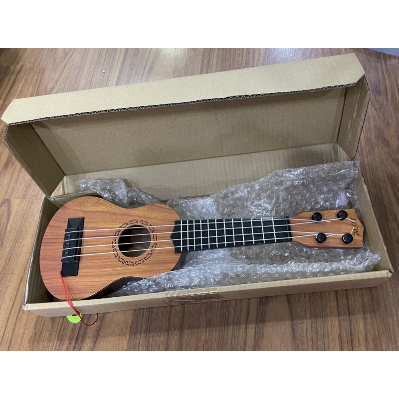 (kích thước như mô tả) (ảnh thật) Mô hình đàn guitar, đàn Ukulele, đàn đồ chơi, đàn mini giúp bé nhận biết nhạc cụ