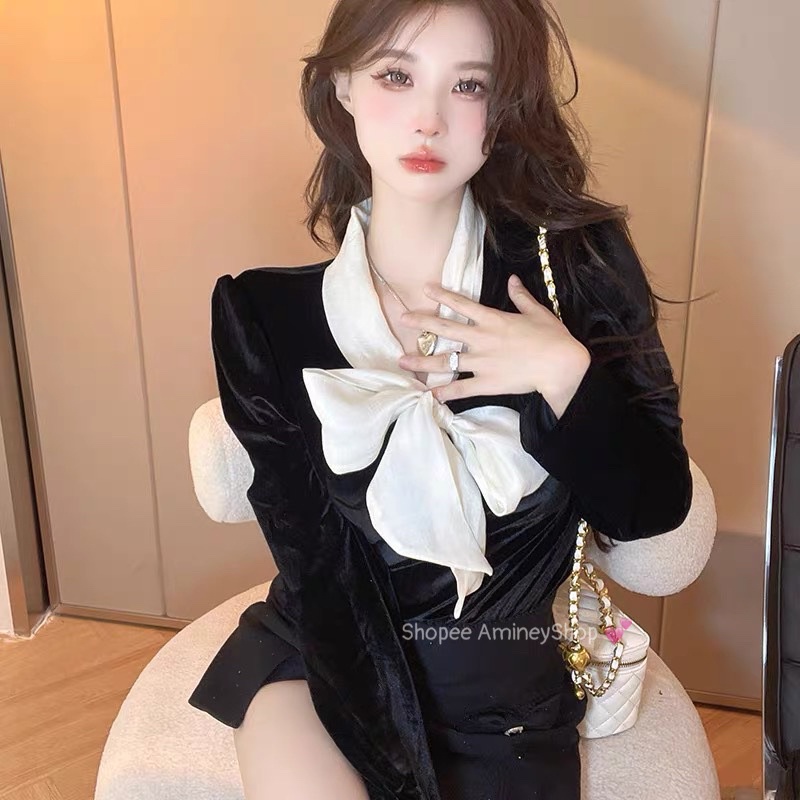 Áo nhung thắt nơ xinh ,màu đen tôn da chất mềm mịn thoải mái .Amineyshop