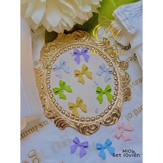 Sale charm nơ k im lo ại m106 set 10viên