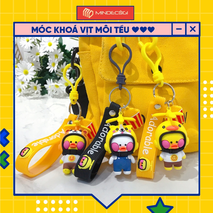 Móc khoá vịt môi tều đội mũ bảo hiểm hình máy bay đáng yêu