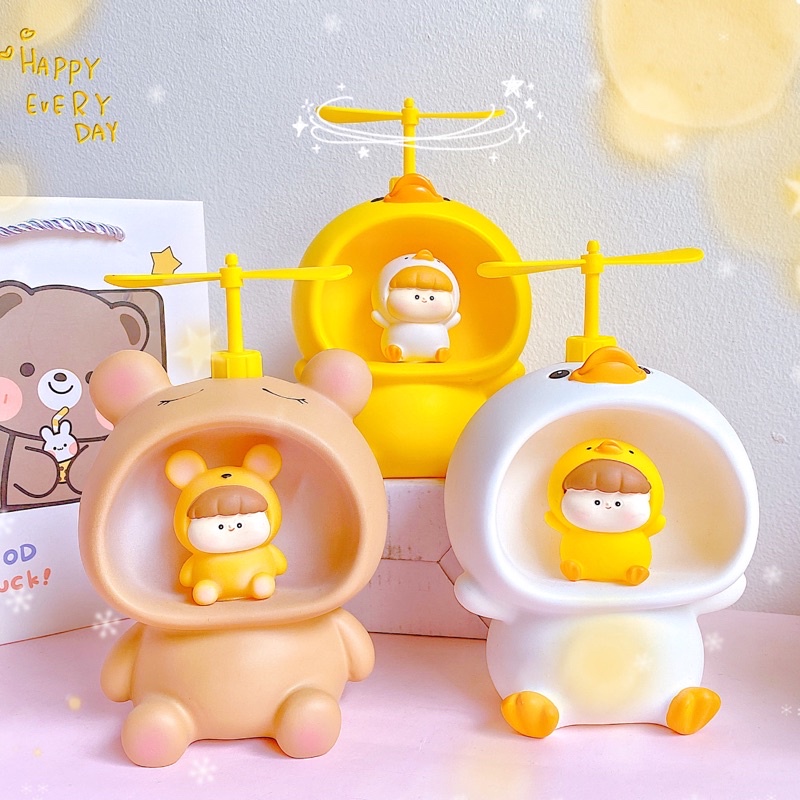Ống heo có chong chóng xoay hoạt hình dễ thương