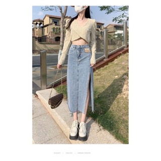 Chân váy xẻ may mác màu xanh