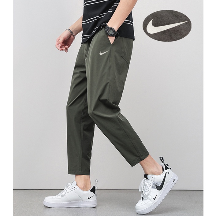 Quần Thể Thao Nike 100% Chính Hãng In Logo Phản Quang Chất Liệu Nylon Co Giãn Tốt Thời Trang Cho Nam Và Nữ
