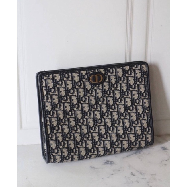 Clutch cầm tay DI O R Pouch thổ cẩm Fullbox