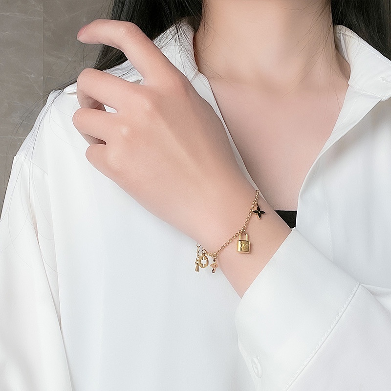 Vòng Đeo Tay Hai Lớp Bằng Kim Loại Titan Mạ Vàng 18K Không Phai Sang Trọng Thanh Lịch Dành Cho Nữ S0K1