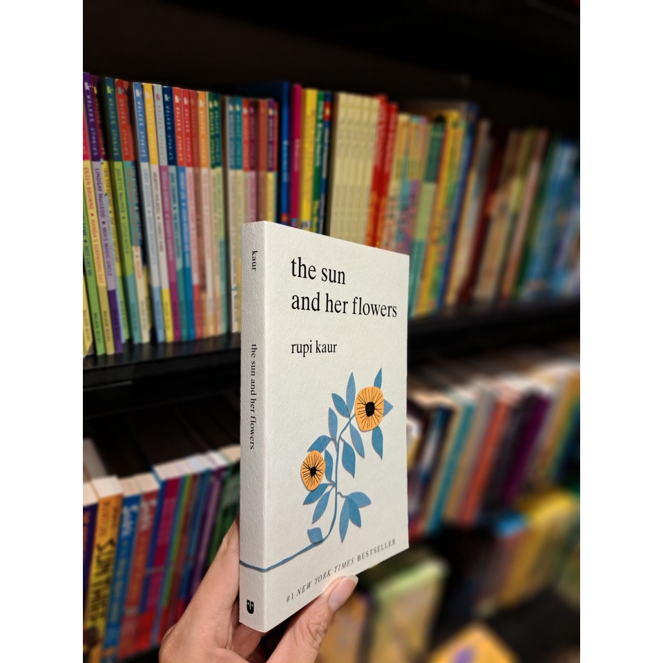 Sách - The Sun and Her Flowers