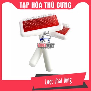 Lượt chải lông cho chó mèo màu trắng
