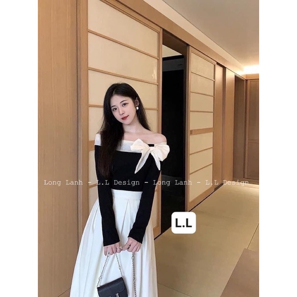 Một chiếc set xinh lắm ạ các nàng uuii .. áo len tăm trễ vai mix tơ nhũ buôic nơ điệu , mix chân váy xoè trắng dài
