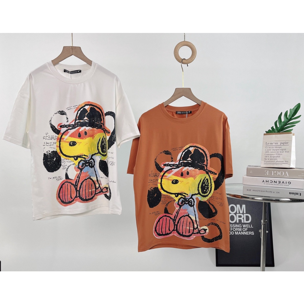 Áo thun nữ ngắn tay cổ tròn in hình Peanut Pencial màu trắng và cam chất cotton 100%