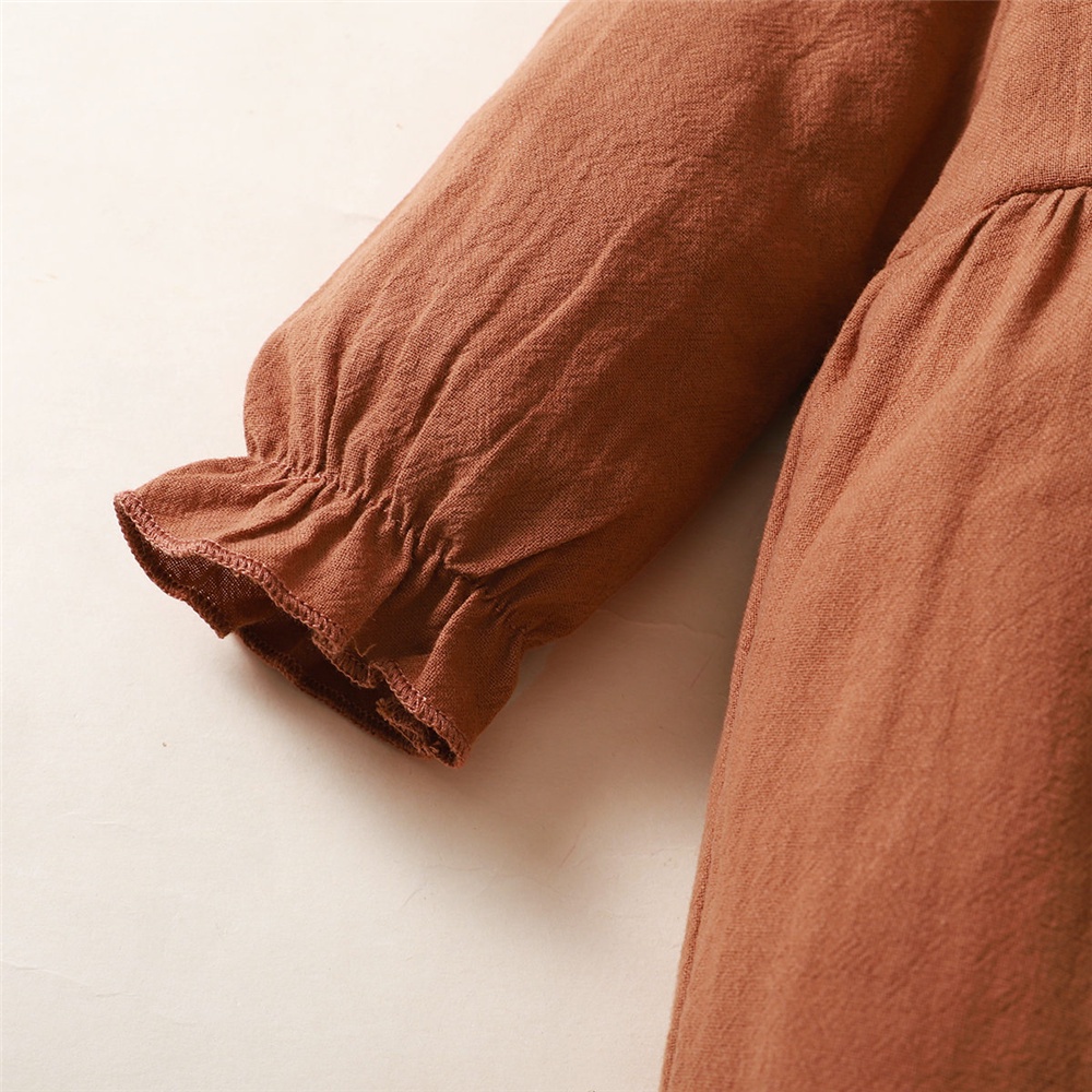 Bộ đồ MIKRDOO gồm áo liền quần tay dài màu nâu trơn kèm băng đô xinh xắn cho bé gái