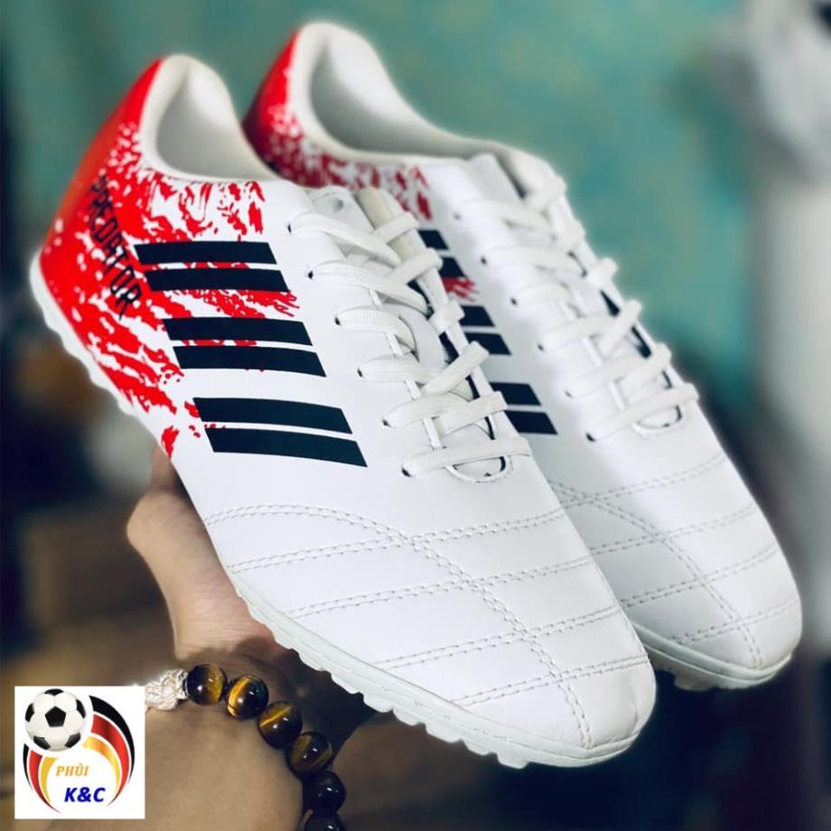 Màu trắng đốm đỏ_Giày đá bóng nam nữ Predator_Giày đá banh sân cỏ nhân tạo_đế cao su đúc, đã khâu full đế