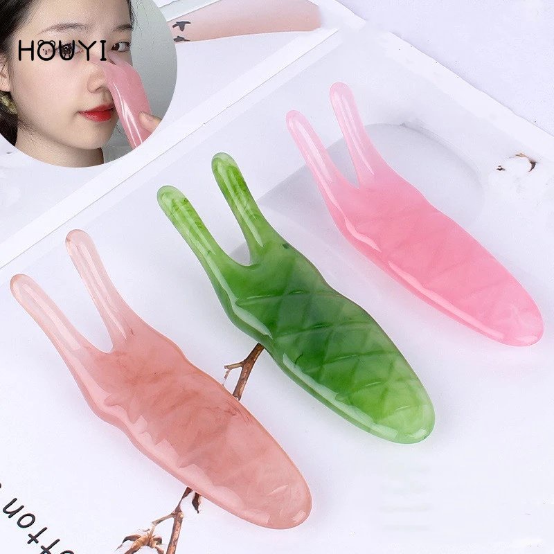 Thanh mát xa mũi bằng nhựa resin có đầu lăn tiện dụng