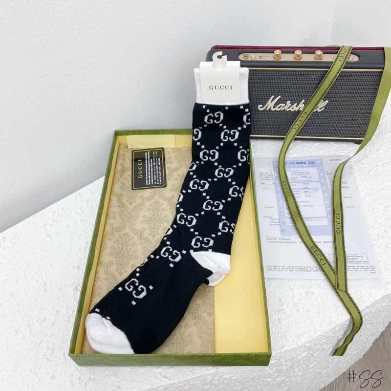 Tất gucci gối