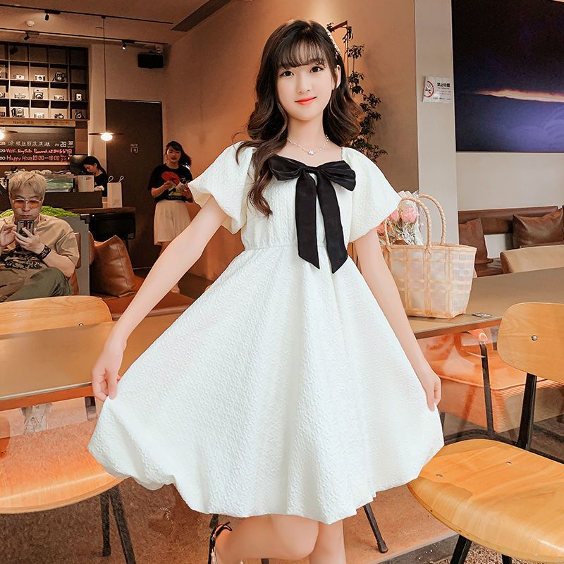 Đầm Công Chúa Màu Trơn Tay Phồng Đính Nơ Phong Cách Hàn Quốc Cho Bé Gái Tuổi Teen