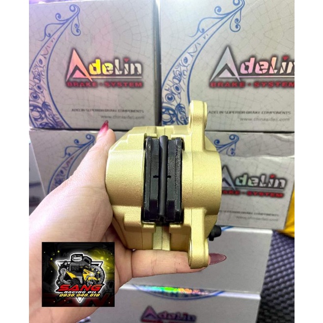 Heo Adelin mos màu vàng Brembo logo đỏ