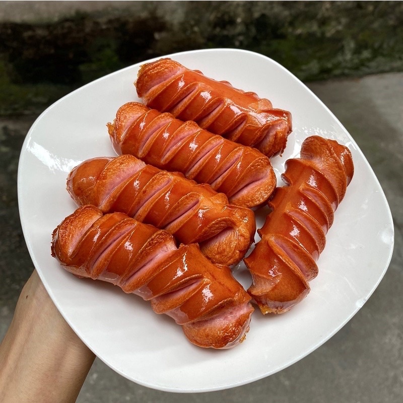 Xúc xích chiên Winner hãng CP chiên rán, thả lẩu tiện lợi