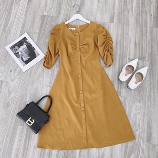 Đầm nhung tăm rúm ngực cúc bọc