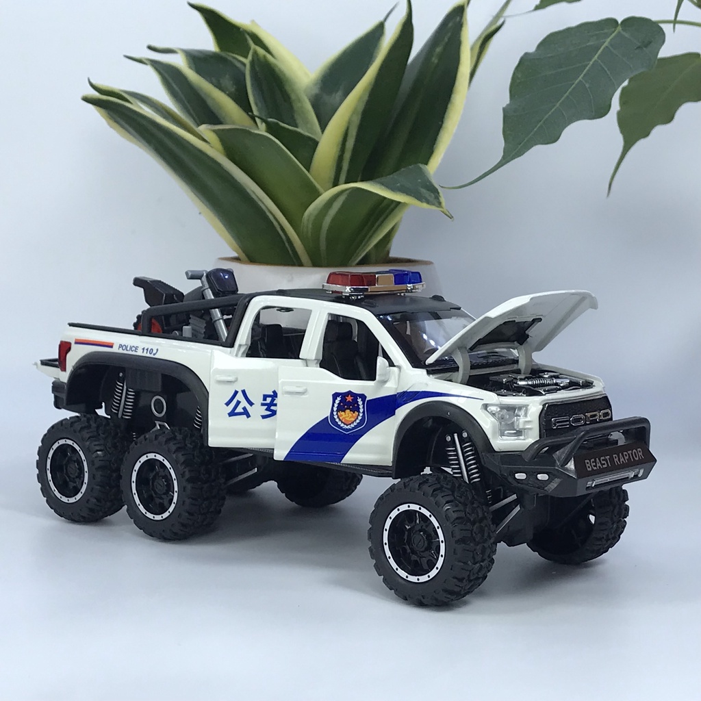 Mô hình xe cảnh sát Ford F150 Raptor 6x6 tỷ lệ 1:28 bằng kim loại có đèn chớp ưu tiên và còi hú chuyên dụng