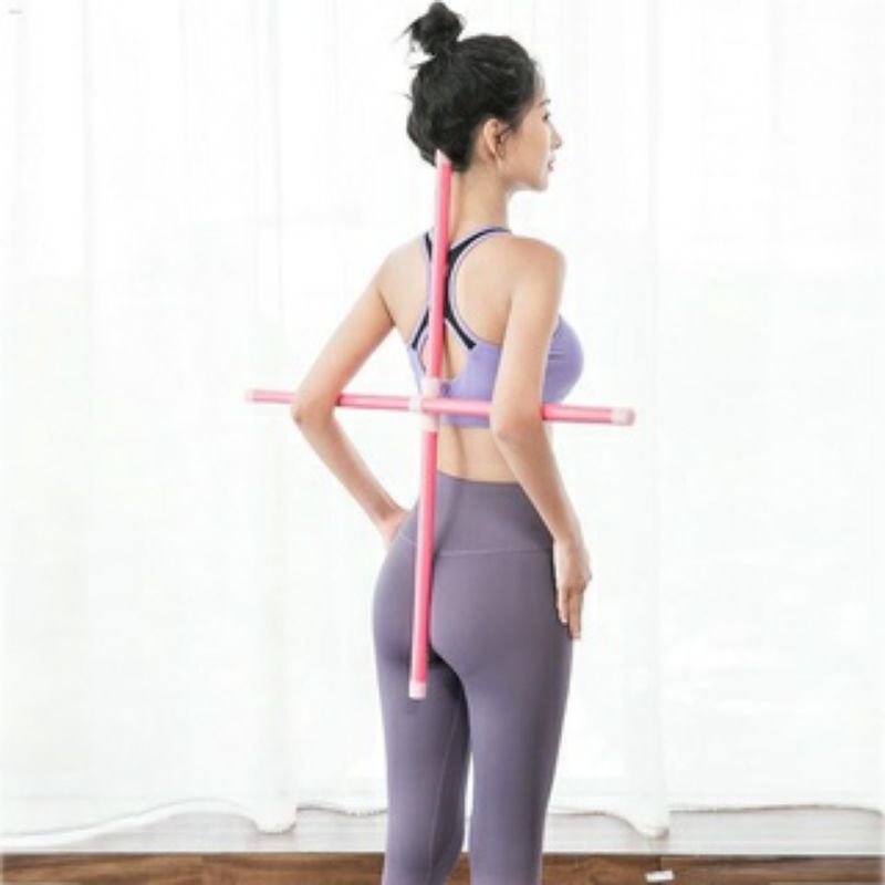 Gậy tập yoga chống gù lưng.