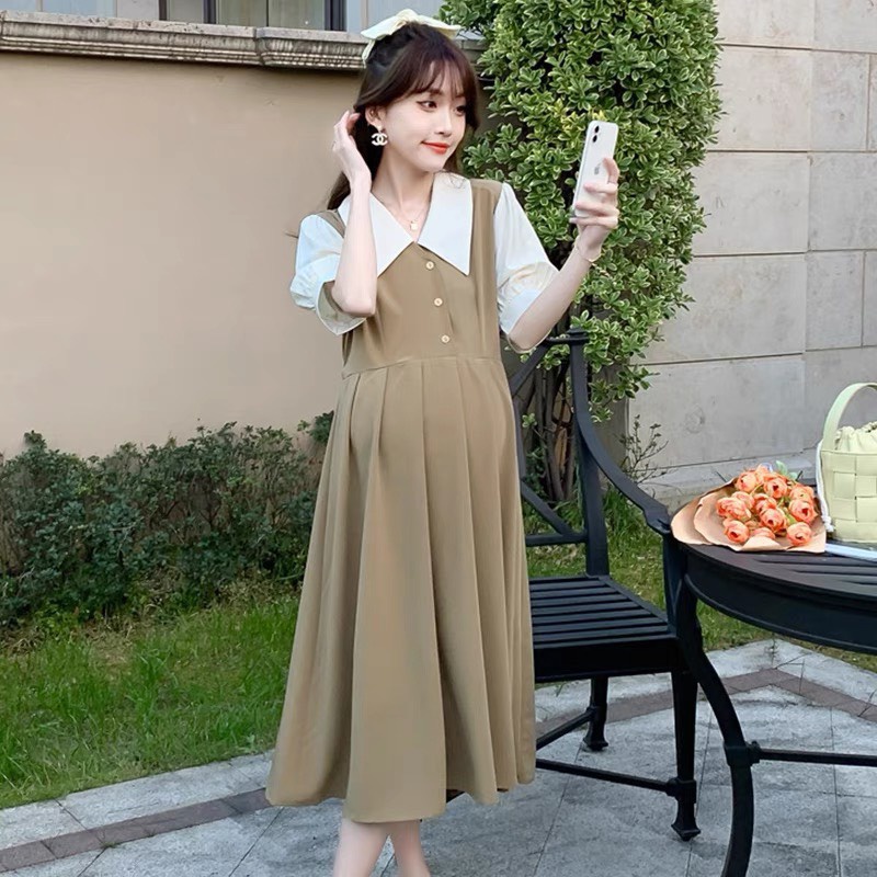 Váy bầu công sở phối xổ sơ mi tay trắng phù hợp với đi làm cũng như đi chơi