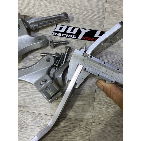 Gác  chân malay kèm  past pô 8ly cho ex 150