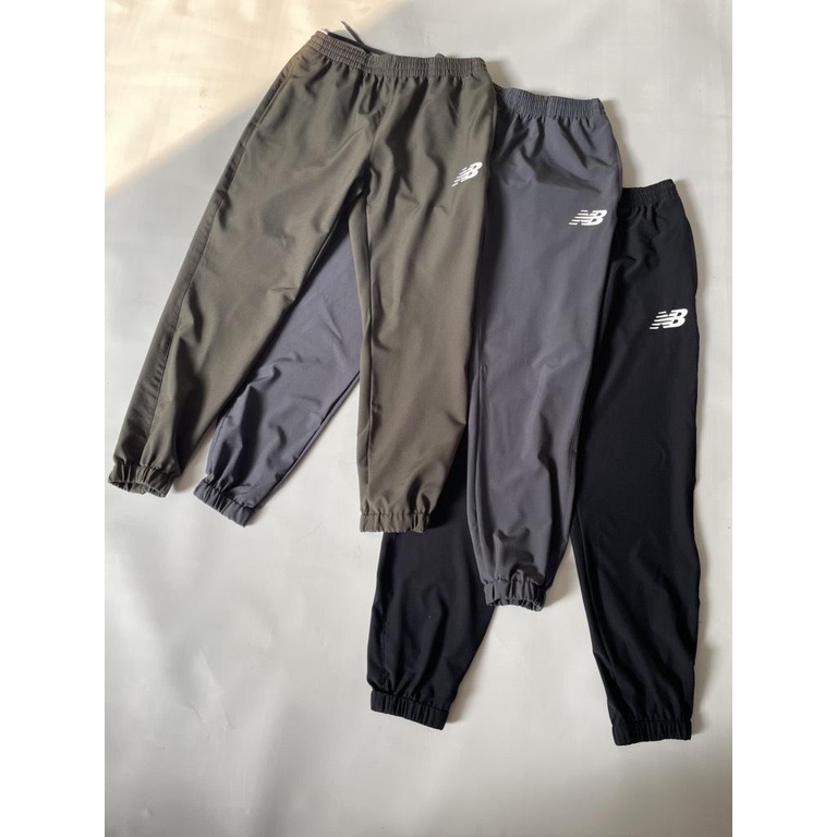 Quần gió nam NB xuất dư xịn