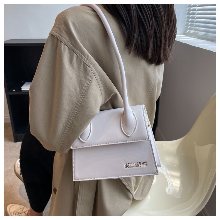 Túi xách nữ cầm tay đeo chéo đeo vai thời thượng quai xoắn có nút bấm LK297