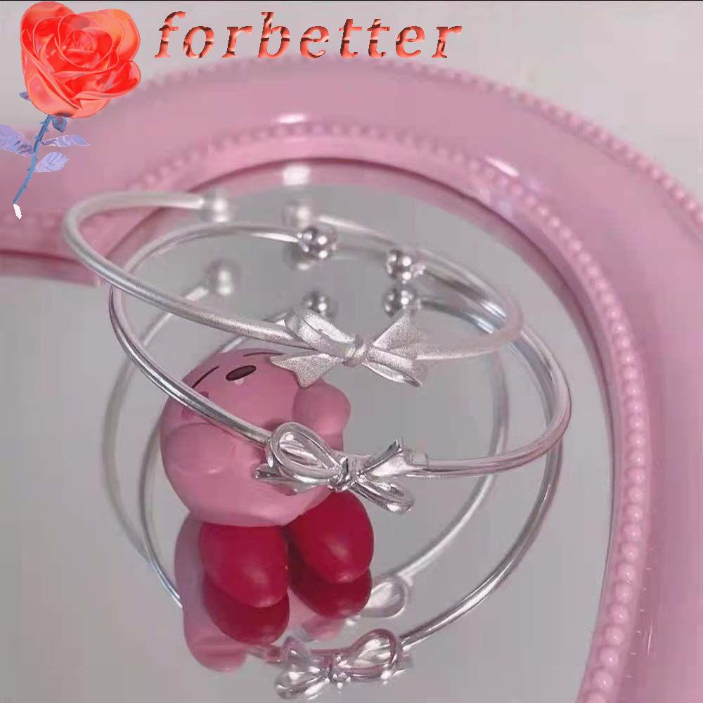 Vòng đeo tay dạng hở chữ C mặt nơ đính chuông phong cách Hàn Quốc màu sắc đáng yêu dành cho nữ