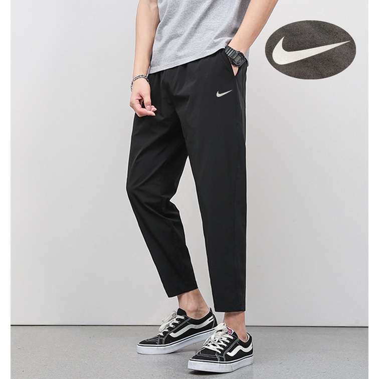 Quần Thể Thao Nike 100% Chính Hãng In Logo Phản Quang Chất Liệu Nylon Co Giãn Tốt Thời Trang Cho Nam Và Nữ