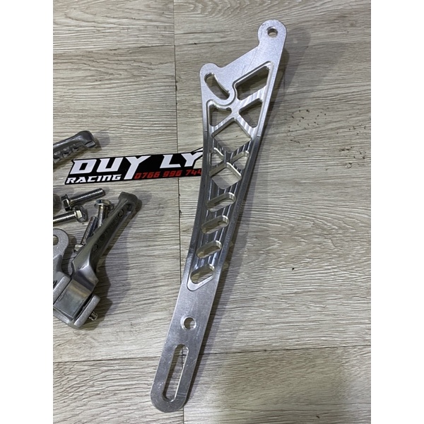 Gác  chân malay kèm  past pô 8ly cho ex 150