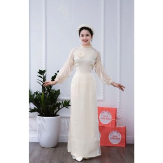 Áo dài voan màu kem, ngực đính hoa , tay bồng chun cách điệu by Quỳnh Hương