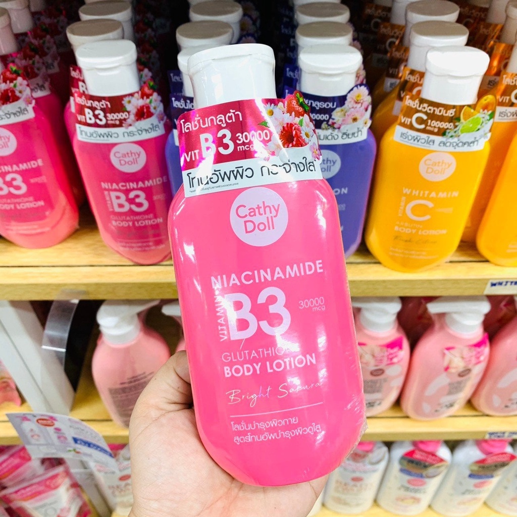 DƯỠNG THỂ HƯƠNG NƯỚC HOA SAKURA NIACINAMIDE VITAMIN B3 GLUTATHIONE BODY LOTION CATHY DOLL 150ML - 13599